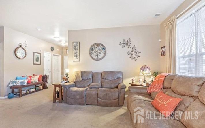 110 Kyle Way Ewing, NJ 08628 - Photo 11 of 39 a living room with furniture and a large window