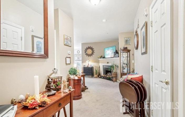 110 Kyle Way Ewing, NJ 08628 - Photo 12 of 39 a living room with furniture and a fireplace
