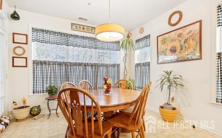 110 Kyle Way Ewing, NJ 08628 - Photo 15 of 39 a dining room filled with furniture and window