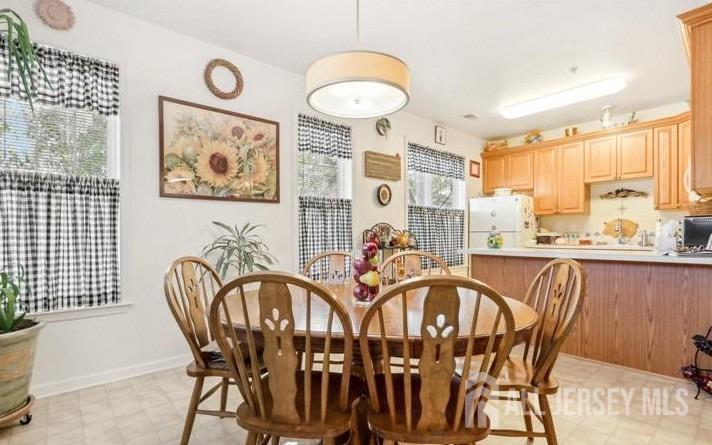 110 Kyle Way Ewing, NJ 08628 - Photo 16 of 39 a view of a dining room with furniture window and outside view