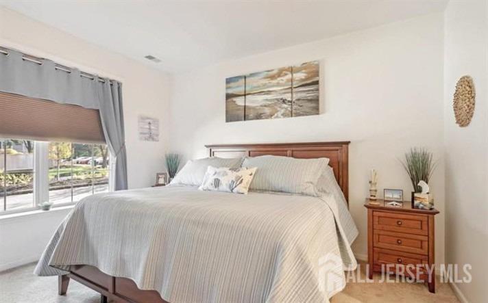 110 Kyle Way Ewing, NJ 08628 - Photo 25 of 39 a bedroom with a bed and a window