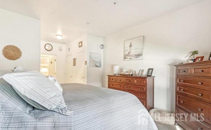 110 Kyle Way Ewing, NJ 08628 - Photo 27 of 39 a bedroom with a bed and a dresser