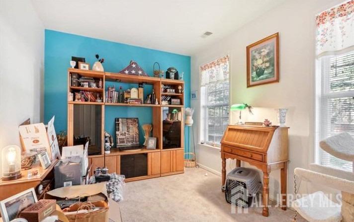 110 Kyle Way Ewing, NJ 08628 - Photo 30 of 39 a bedroom with furniture and a book shelf