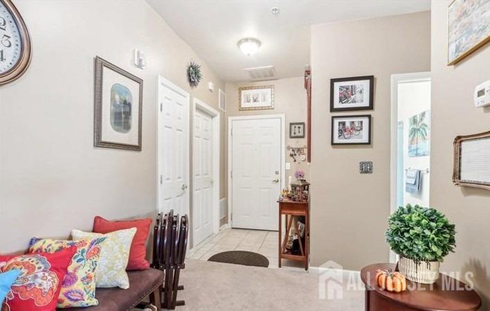110 Kyle Way Ewing, NJ 08628 - Photo 3 of 39 a living room with furniture and a potted plant