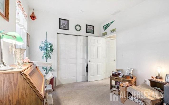 110 Kyle Way Ewing, NJ 08628 - Photo 31 of 39 a living room with furniture and a potted plant