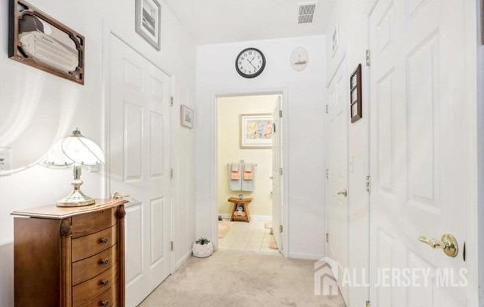 110 Kyle Way Ewing, NJ 08628 - Photo 32 of 39 a bathroom with a granite countertop shower a mirror and a sink