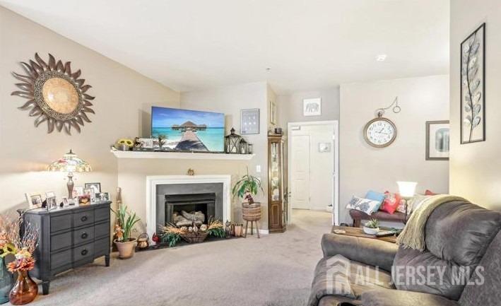 110 Kyle Way Ewing, NJ 08628 - Photo 5 of 39 a living room with furniture and a fireplace