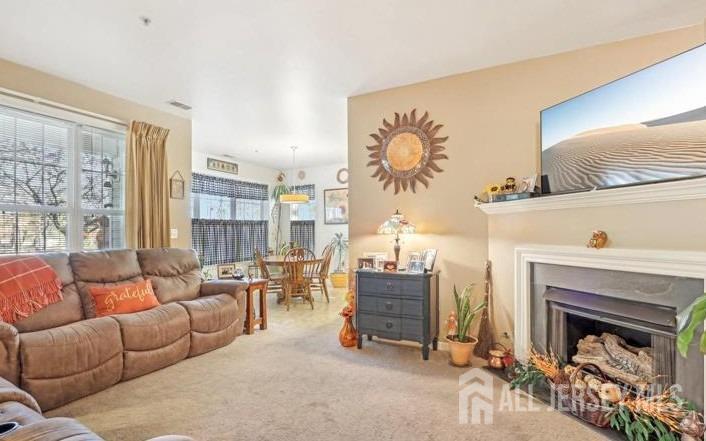 110 Kyle Way Ewing, NJ 08628 - Photo 10 of 39 a living room with furniture and a fireplace