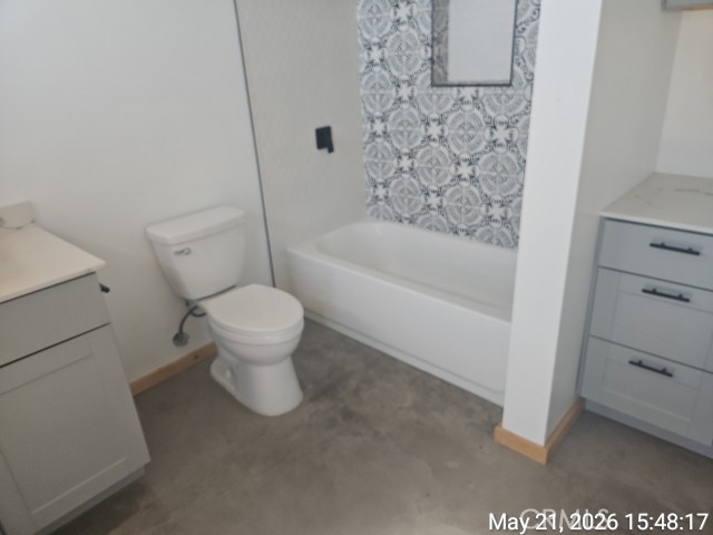 65154 Hoover Aka Mars St Road Joshua Tree, CA 92252 - Photo 7 of 11 a white toilet sitting next to a bath tub