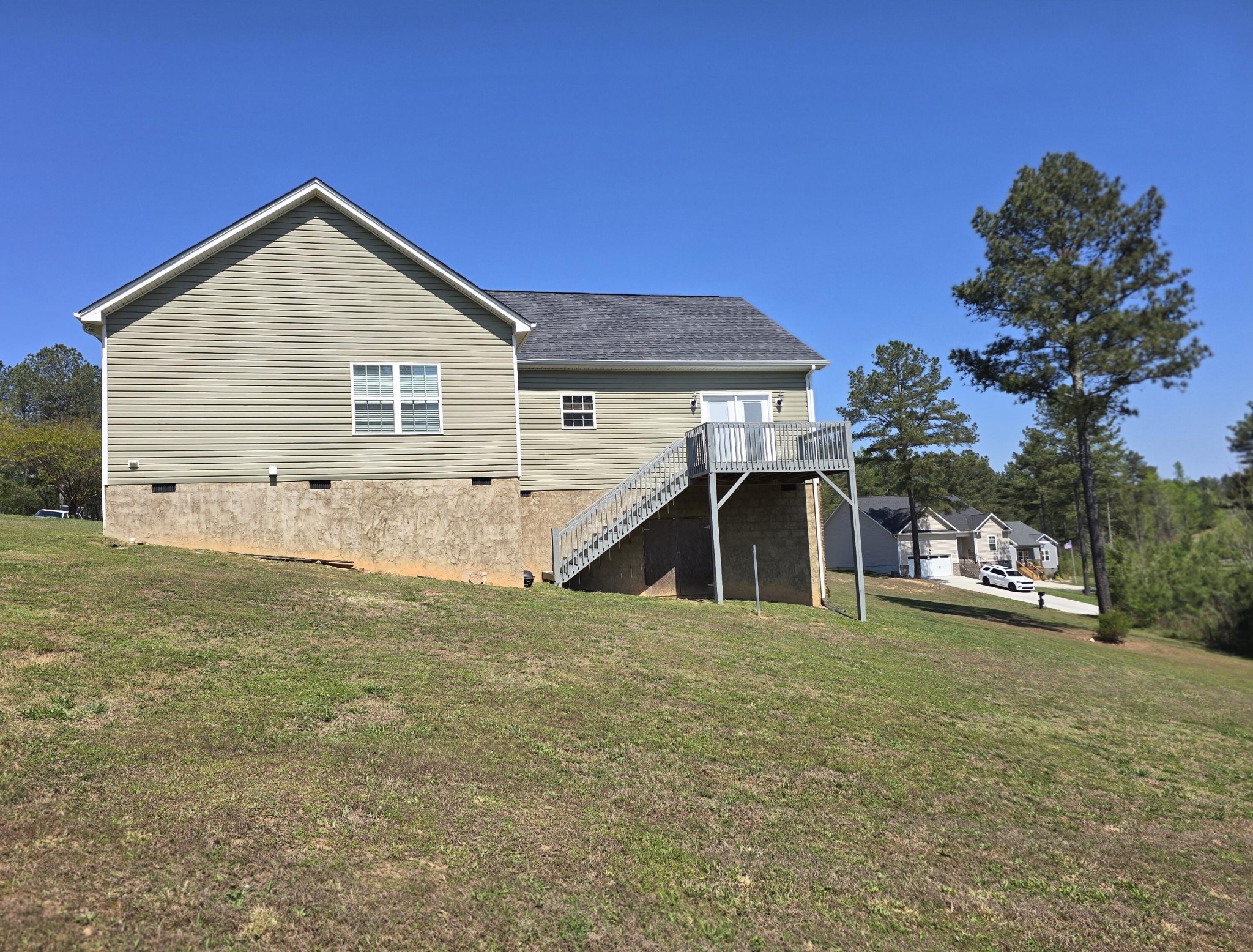 231 Clara Lane Dayton, TN 37321 - Photo 14 of 17 a view of a house with a yard and sitting area