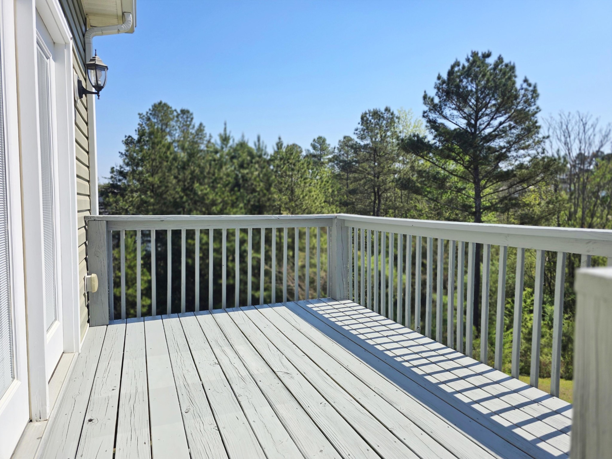 231 Clara Lane Dayton, TN 37321 - Photo 17 of 17 a balcony with wooden floor and fence