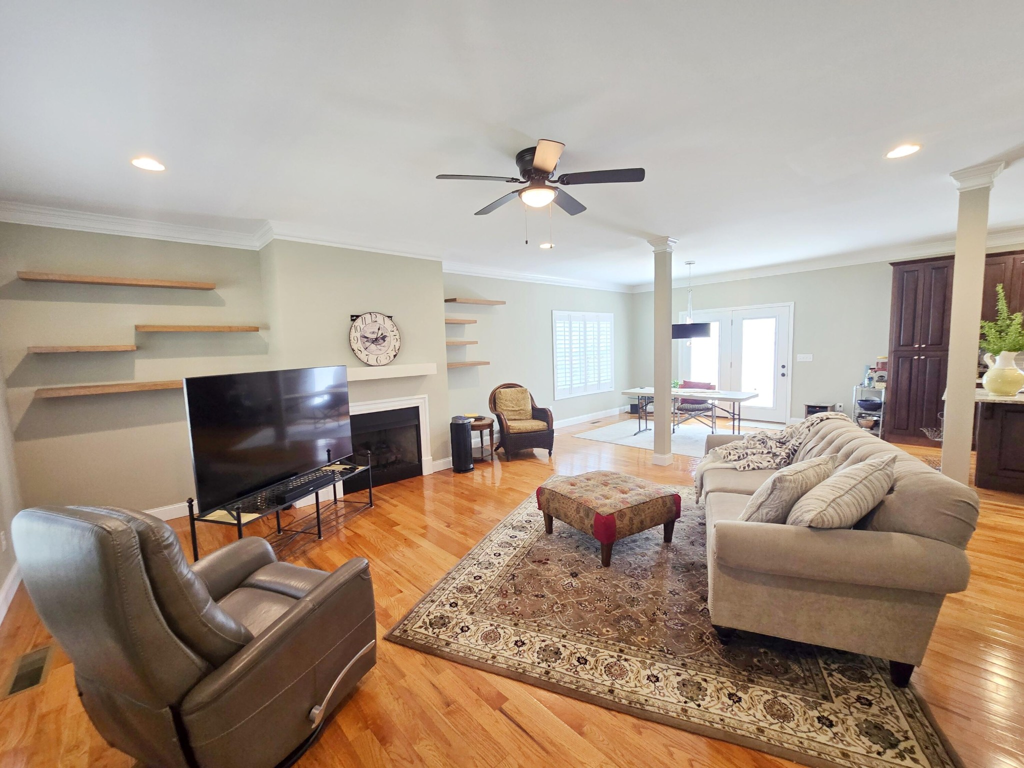 231 Clara Lane Dayton, TN 37321 - Photo 3 of 17 a living room with fireplace furniture and a flat screen tv