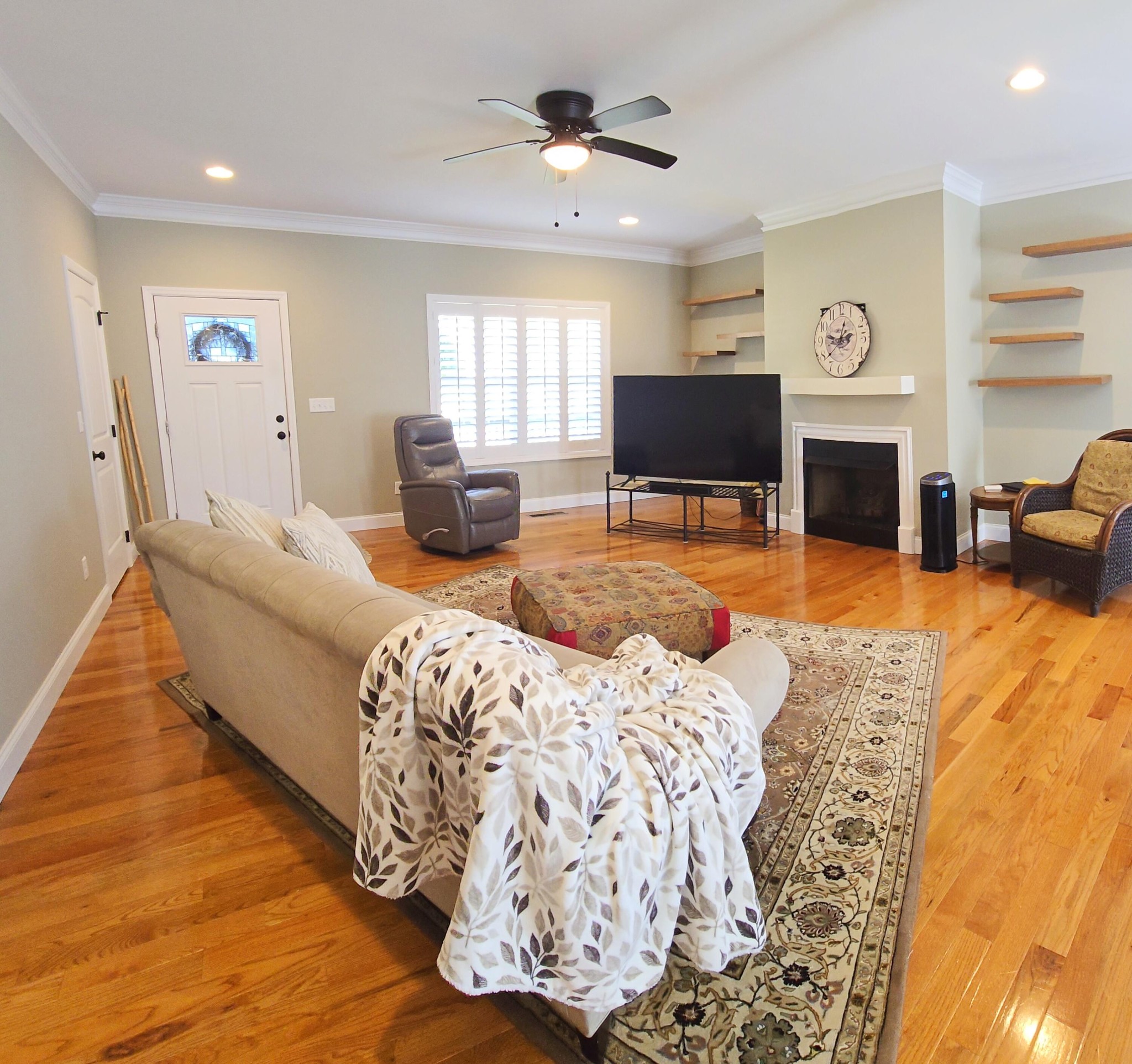 231 Clara Lane Dayton, TN 37321 - Photo 4 of 17 a living room with furniture and a fireplace