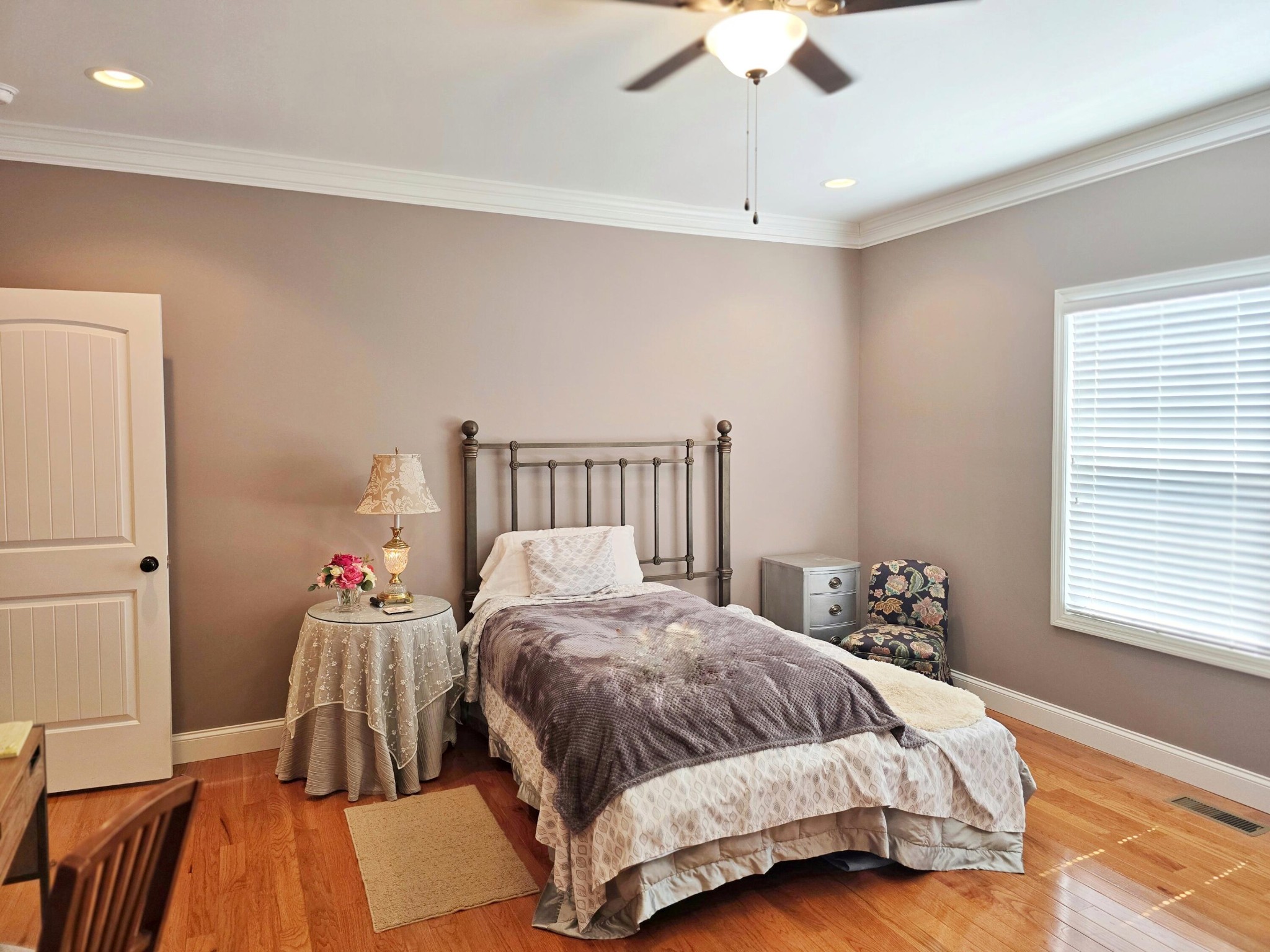 231 Clara Lane Dayton, TN 37321 - Photo 9 of 17 a bedroom with a bed and wooden floor