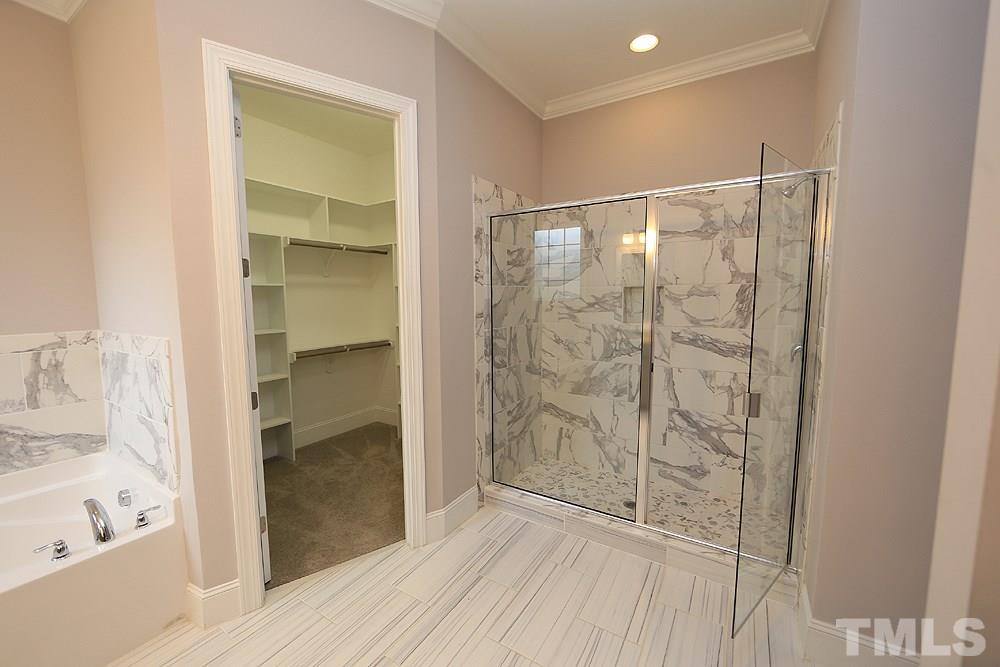 449 Rose Lane Raleigh, NC 27610 - Photo 8 of 14 a bathroom with a shower and a tub