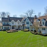 a view of a house with a big yard