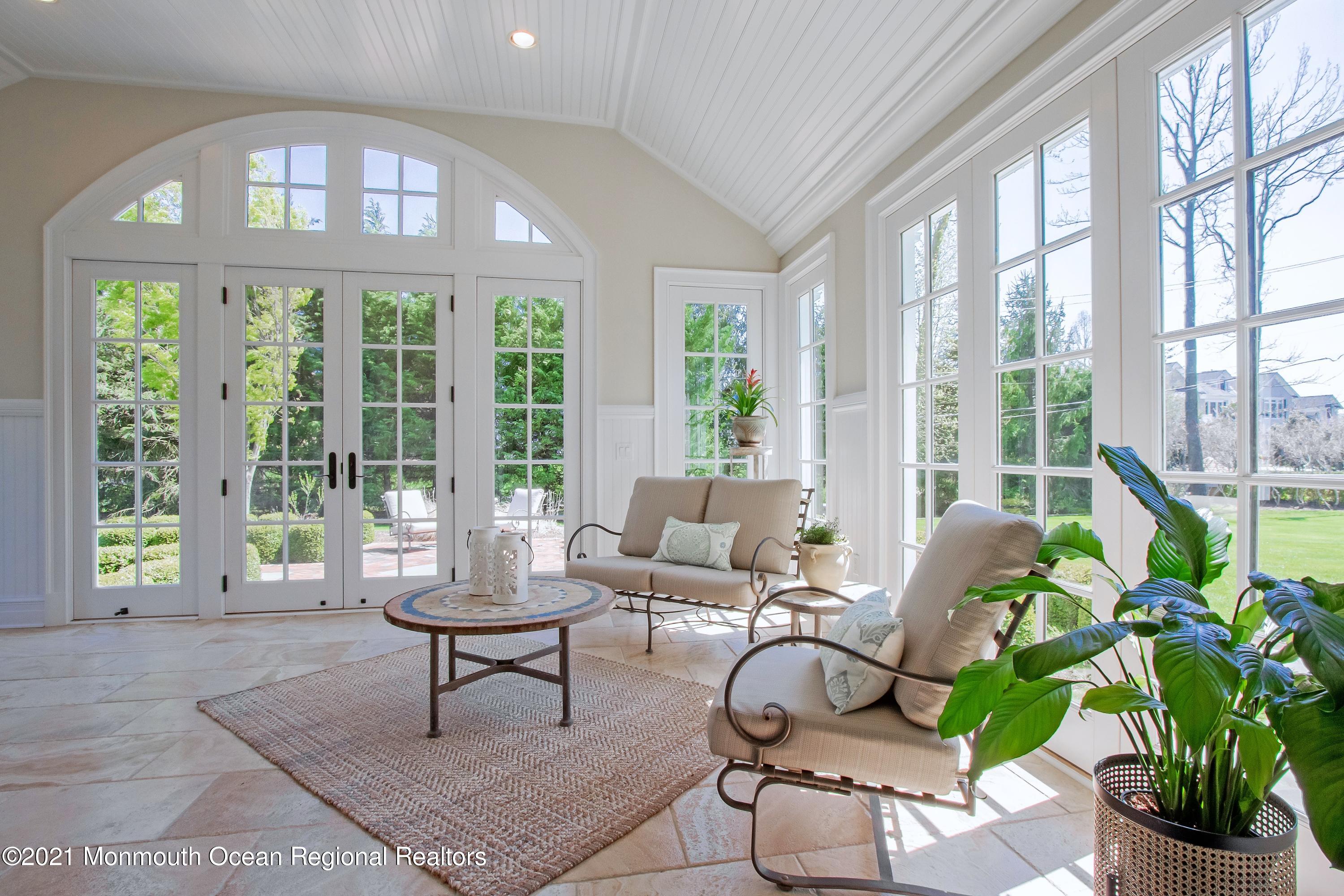 21 Conover Lane Rumson, NJ 07760 - Photo 12 of 40 a living room with furniture and a large window