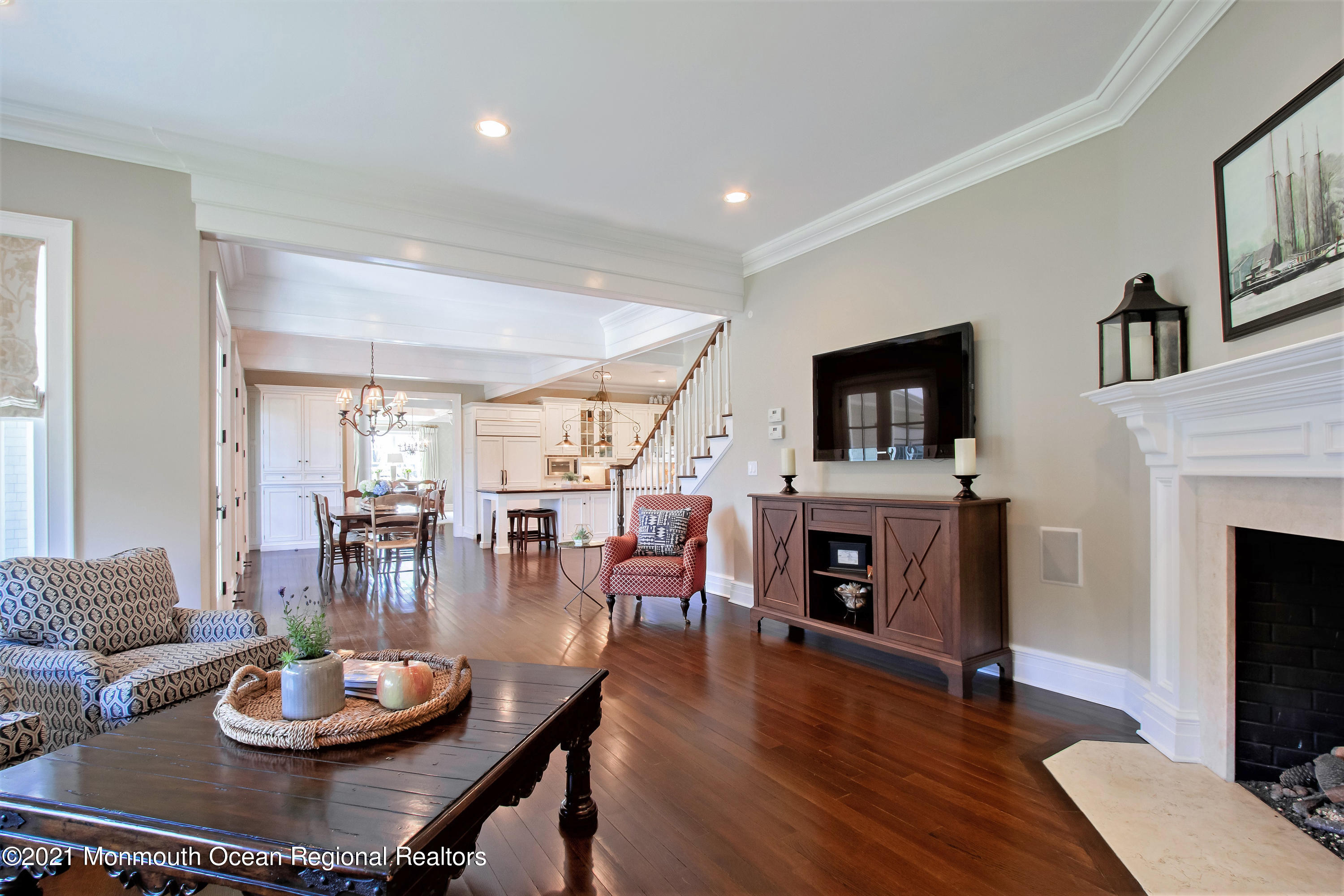21 Conover Lane Rumson, NJ 07760 - Photo 19 of 40 a living room with fireplace furniture and a flat screen tv