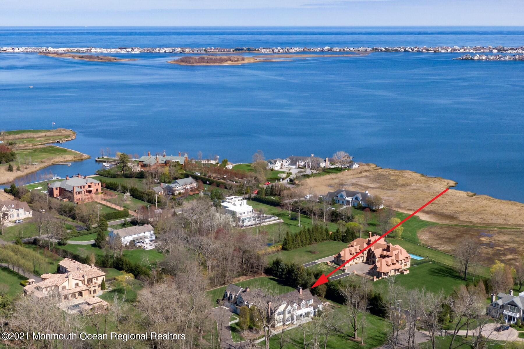 21 Conover Lane Rumson, NJ 07760 - Photo 3 of 40 a view of lake with outdoor space
