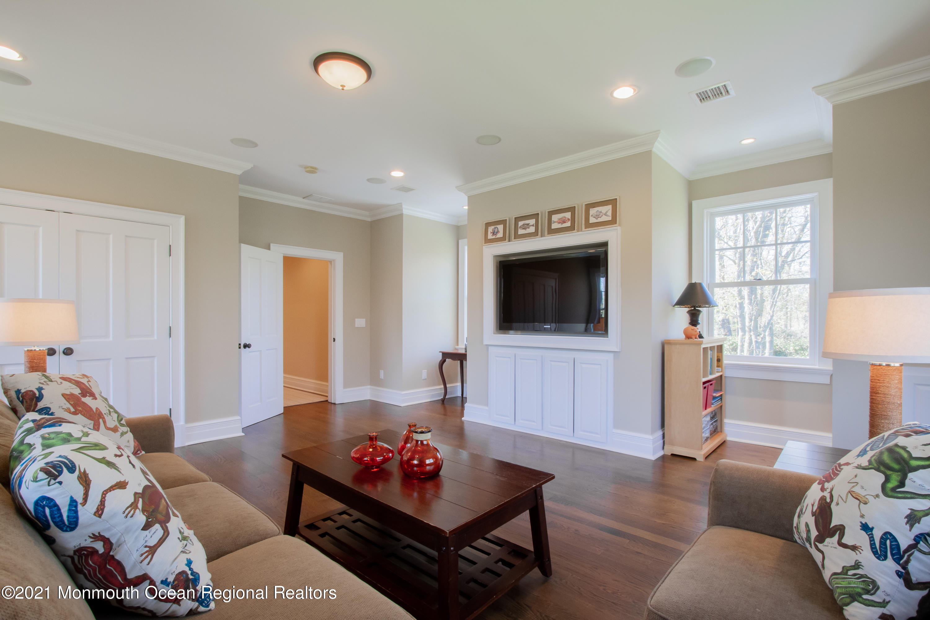 21 Conover Lane Rumson, NJ 07760 - Photo 36 of 40 a living room with furniture and a flat screen tv