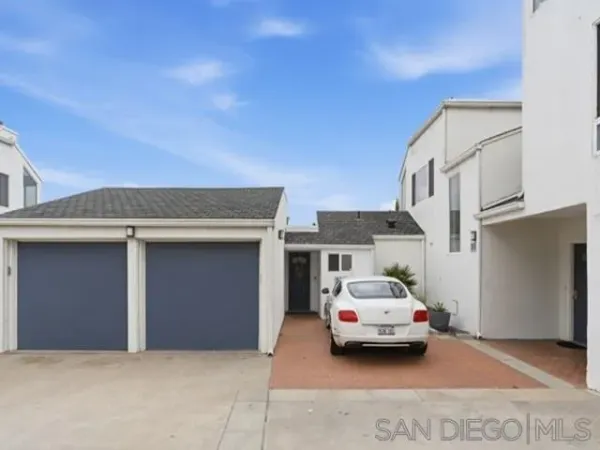 a car parked in front of a house