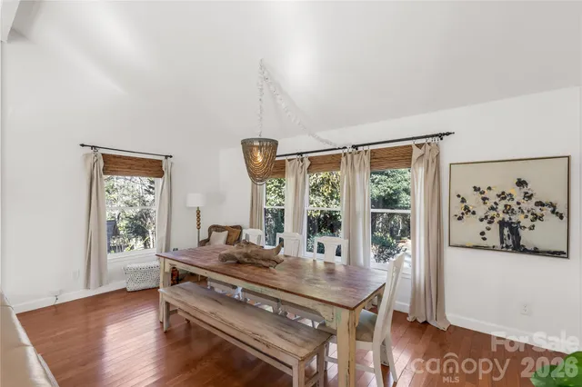 a room with furniture and wooden floor