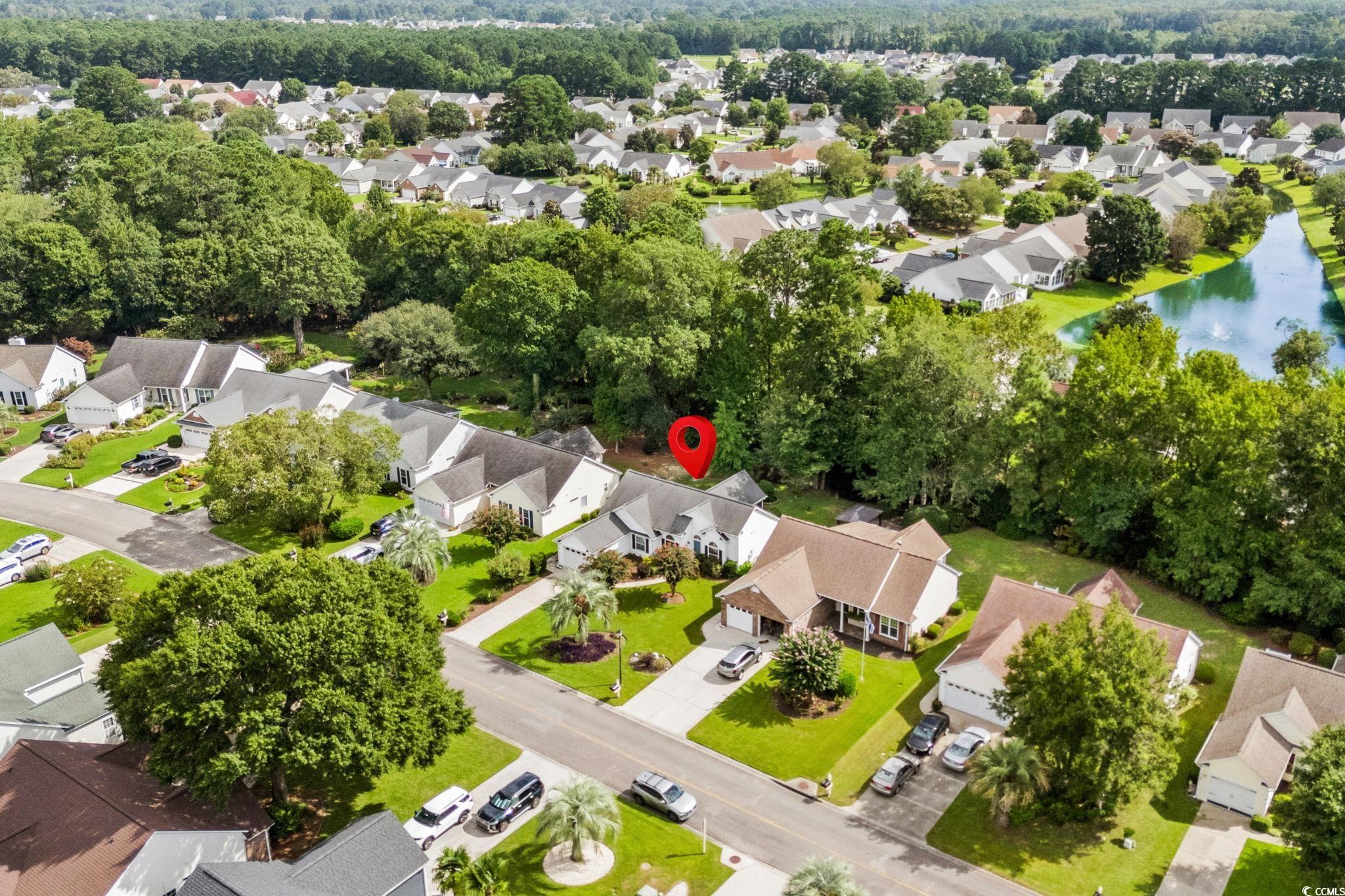 9568 Indigo Club Drive Murrells Inlet, SC 29576 - Photo 37 of 40 Aerial view of residential area featuring a nearby body of water