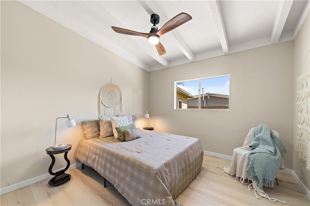 17042 Rorimer Street La Puente, CA 91744 - Photo 11 of 31 Guest bed with a large window and cieling fan for comfort.