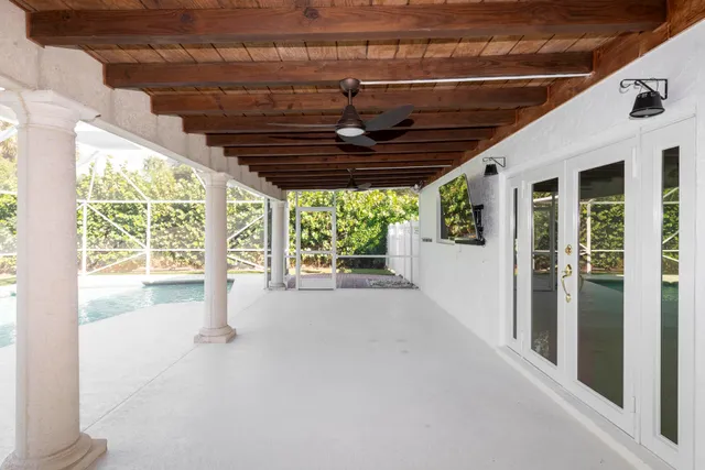 an aerial view of lake and residential houses with outdoor space and lake view