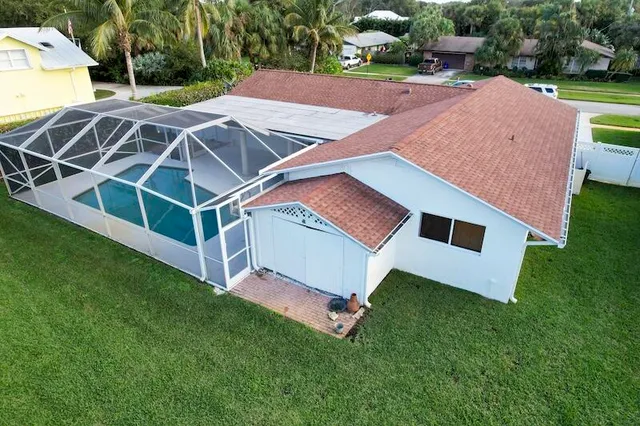 a view of a house with a swimming pool