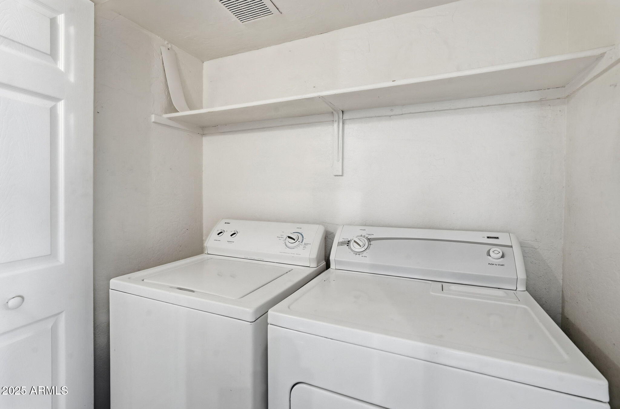 14145 North 92nd Street, Unit 2028 Scottsdale, AZ 85260 - Photo 21 of 24 a utility room with dryer and washer