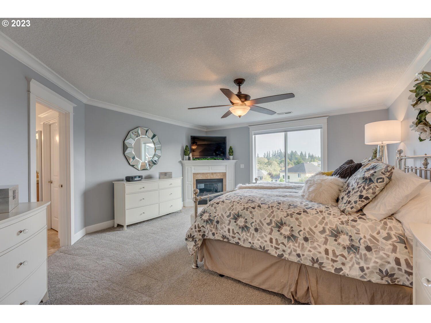 1913 South 15th Circle Ridgefield, WA 98642 - Photo 18 of 33 a bedroom with a large bed and a window