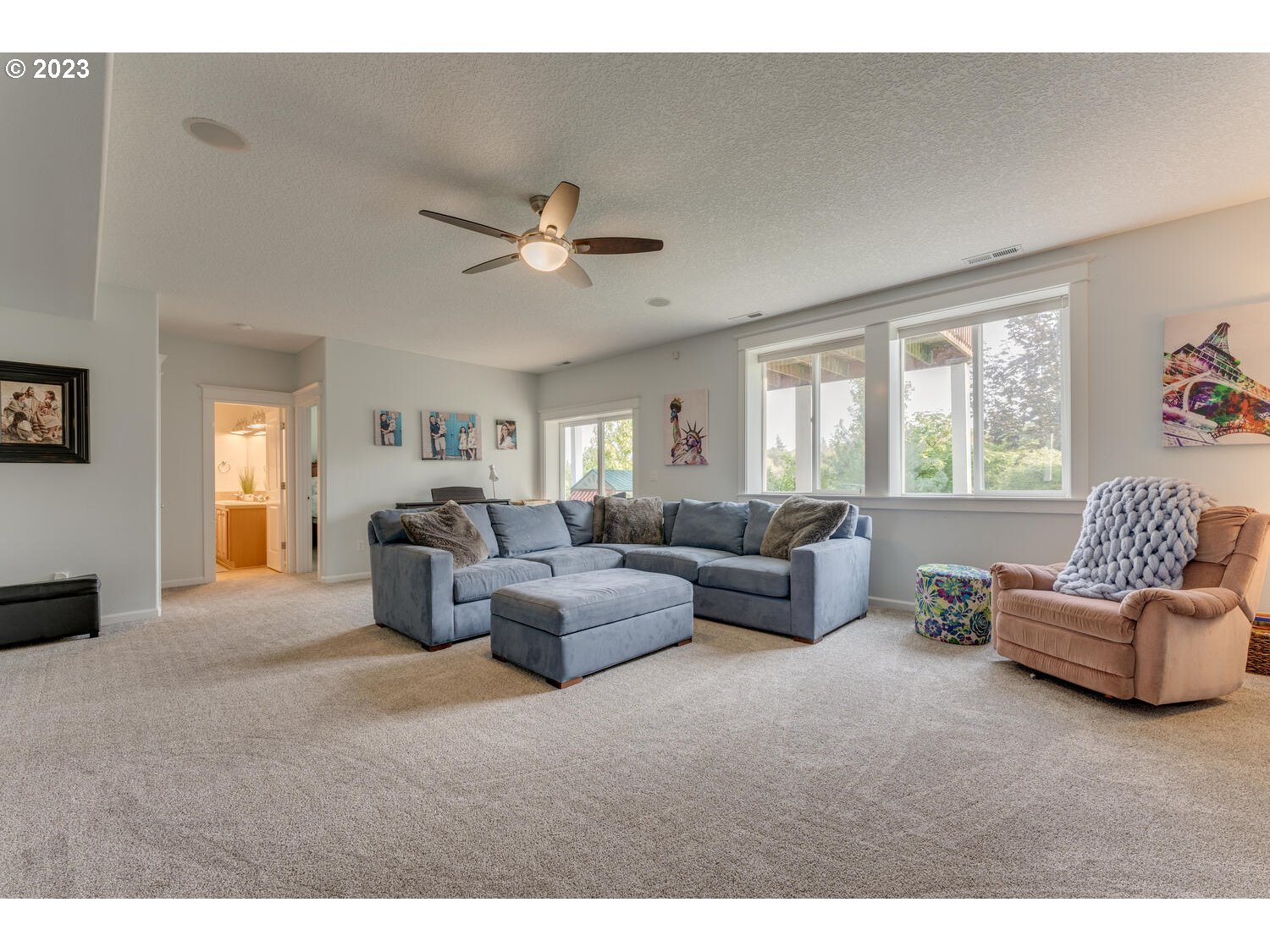 1913 South 15th Circle Ridgefield, WA 98642 - Photo 26 of 33 a living room with furniture and a large window