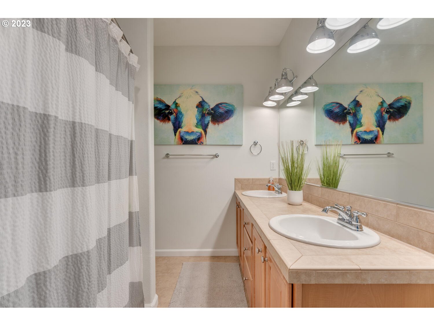 1913 South 15th Circle Ridgefield, WA 98642 - Photo 27 of 33 a bathroom with a sink vanity and a mirror