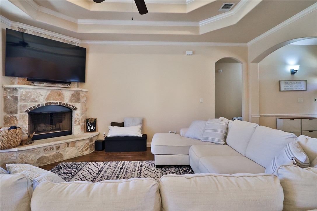 3900 Ambrose Court Bryan, TX 77808 - Photo 14 of 34 a living room with furniture and a fireplace