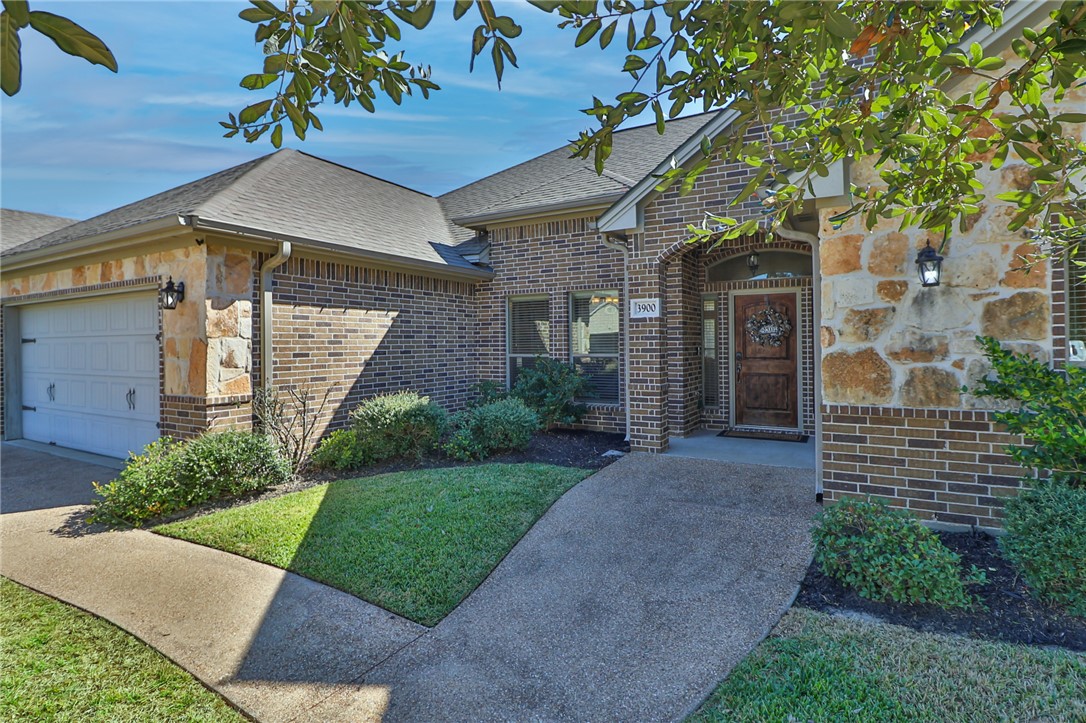 3900 Ambrose Court Bryan, TX 77808 - Photo 2 of 34 a front view of a house with garden