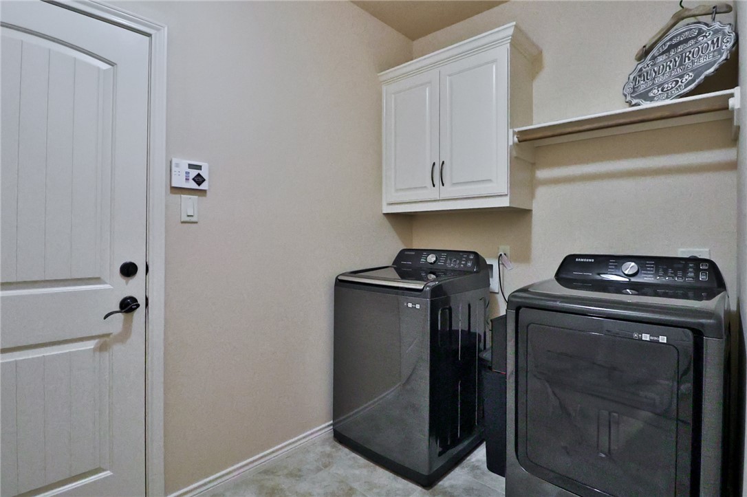 3900 Ambrose Court Bryan, TX 77808 - Photo 23 of 34 a view of washer and dryer