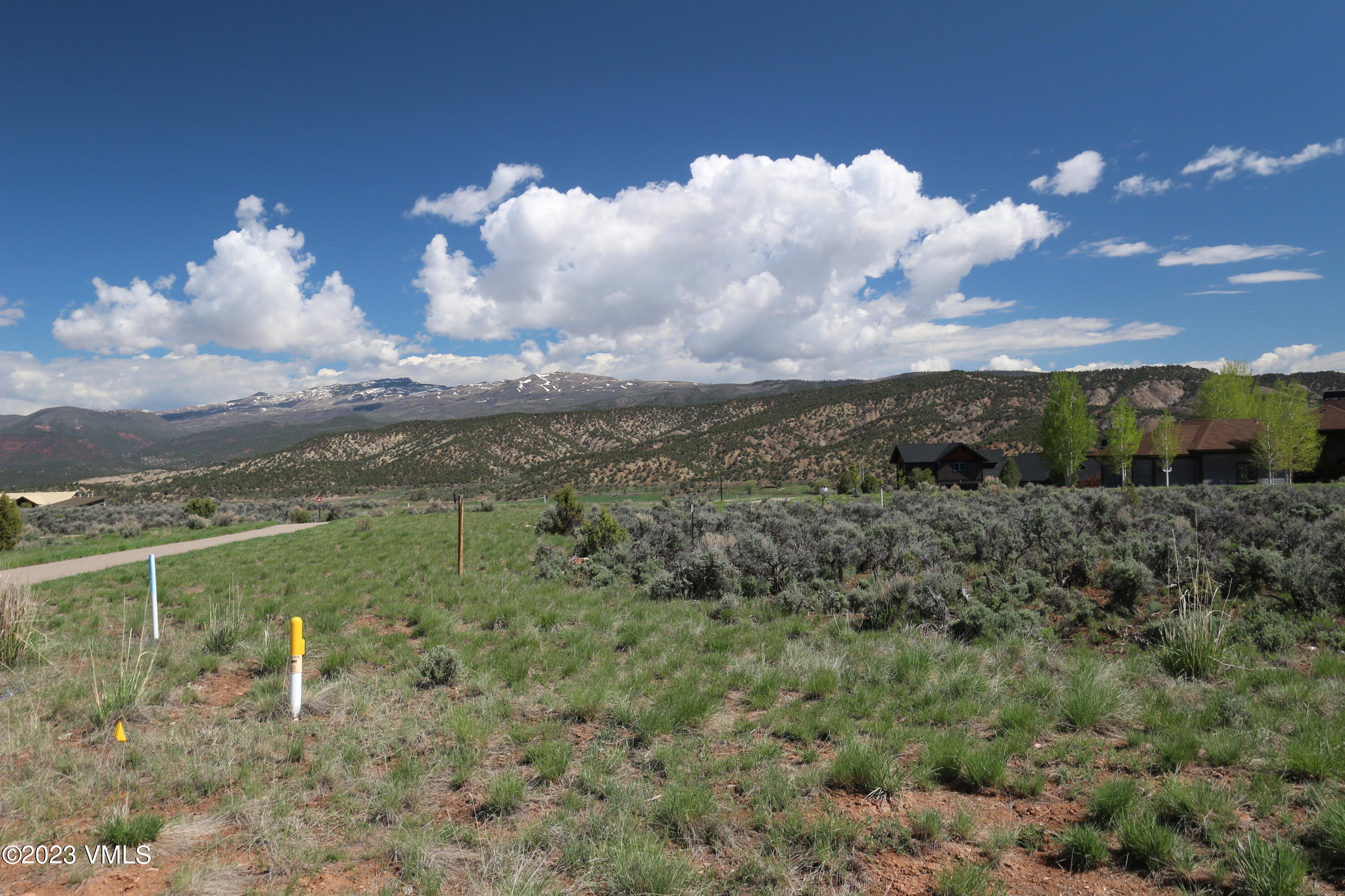 100 Prospect Peak Road Eagle, CO 81631 - Photo 18 of 63 a view of a yard with an outdoor space and seating area