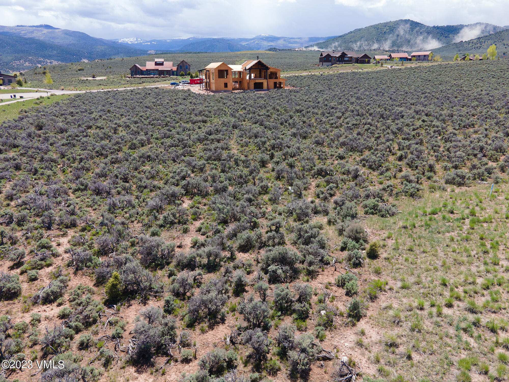 100 Prospect Peak Road Eagle, CO 81631 - Photo 19 of 63 a view of a dry yard with mountains