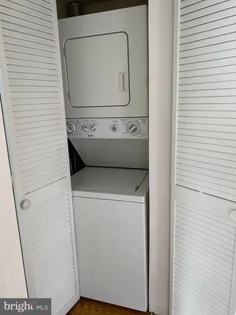 a bathroom with a bathtub and a toilet