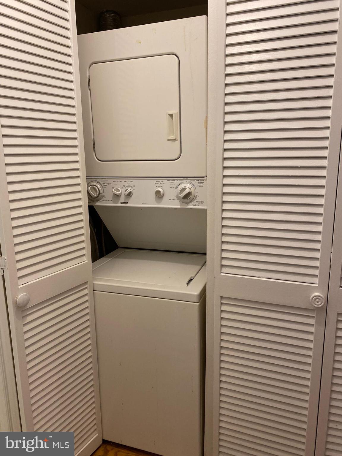 42 Conshohocken State Road, Unit 8D Bala Cynwyd, PA 19004 - Photo 5 of 20 a utility room with dryer and washer