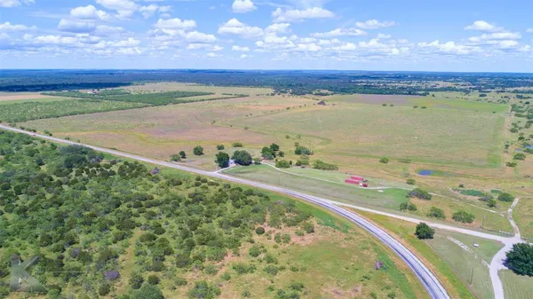 a view of an ocean and a mountain