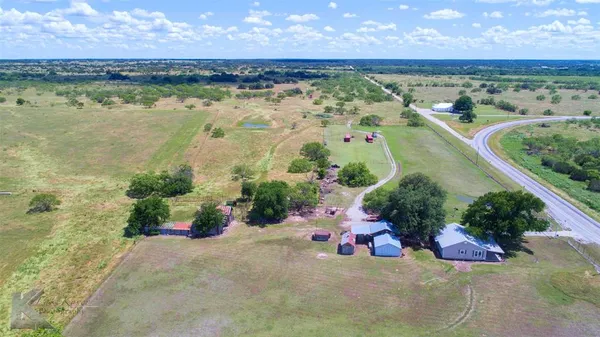 a view of a garden with an outdoor space