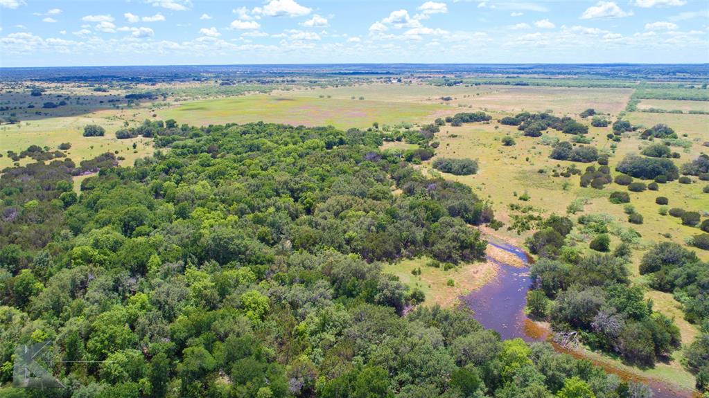 7528 Farm To Market 717 Ranger, TX 76470 - Photo 27 of 38 a view of a lake and a yard