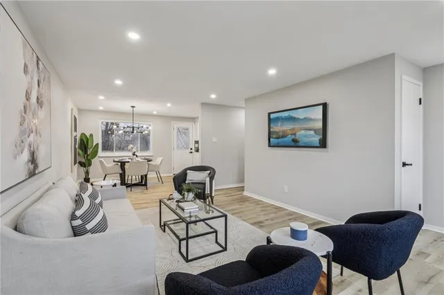 a living room with furniture and a couch