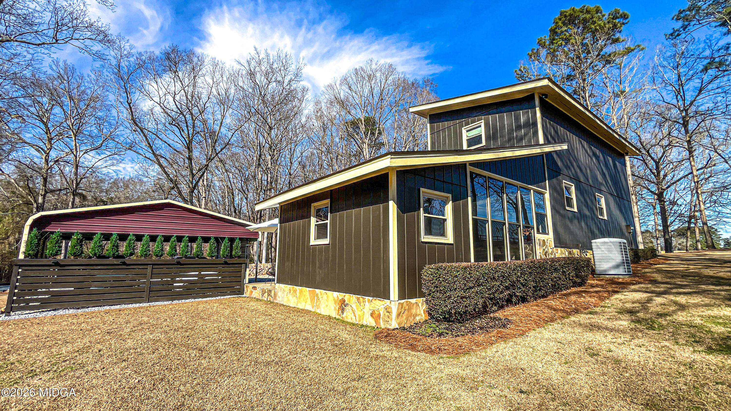 523 Fredonia Church Road Barnesville, GA 30204 - Photo 11 of 78 a front view of a house with yard and trees
