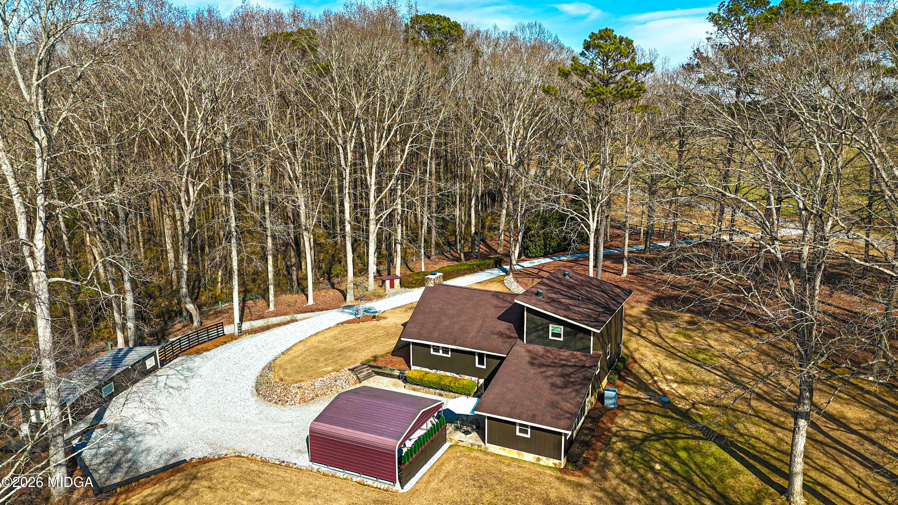 523 Fredonia Church Road Barnesville, GA 30204 - Photo 2 of 78 a view of a patio with chairs next to a yard