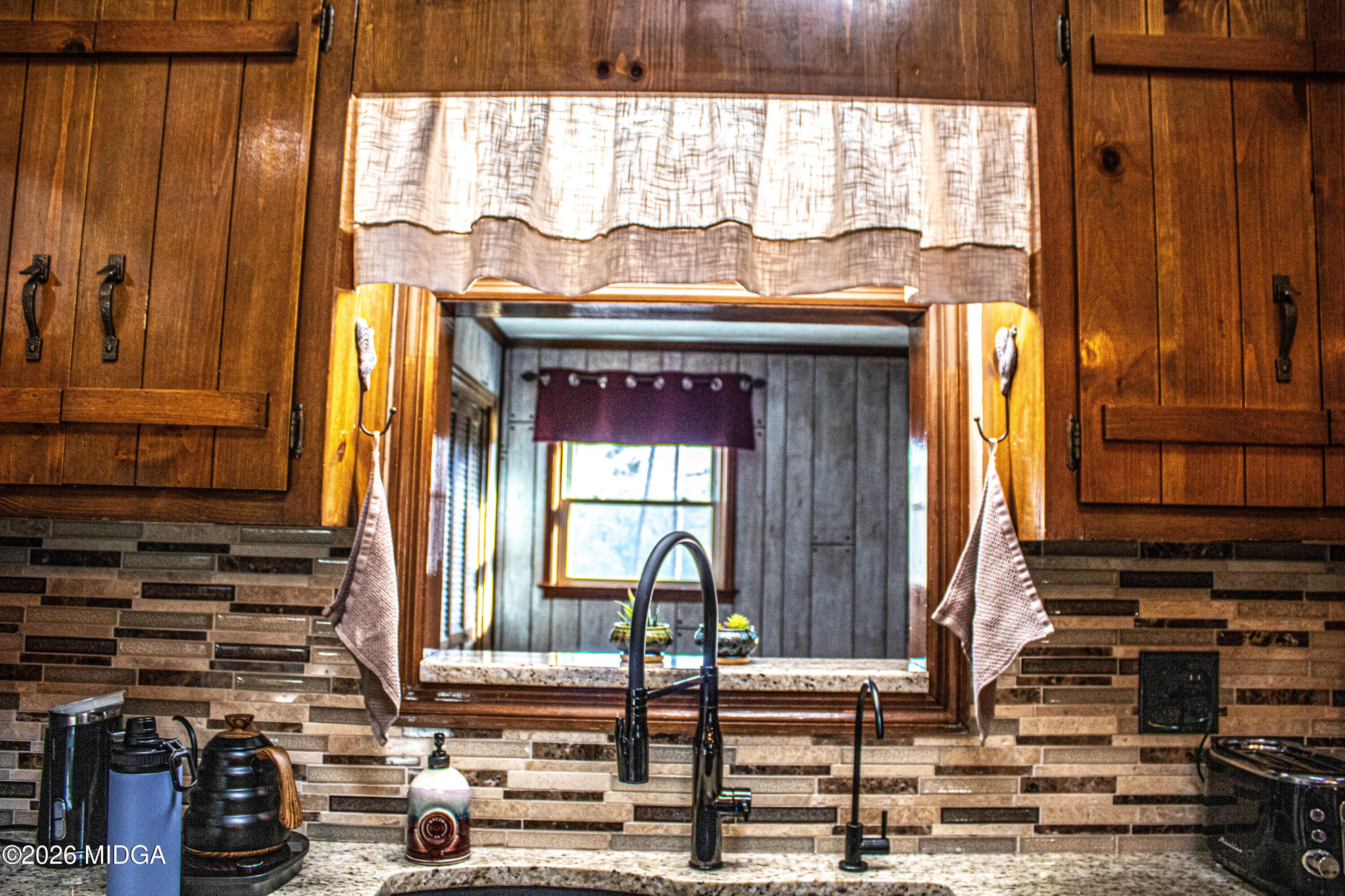523 Fredonia Church Road Barnesville, GA 30204 - Photo 40 of 78 a bathroom with a sink and a mirror
