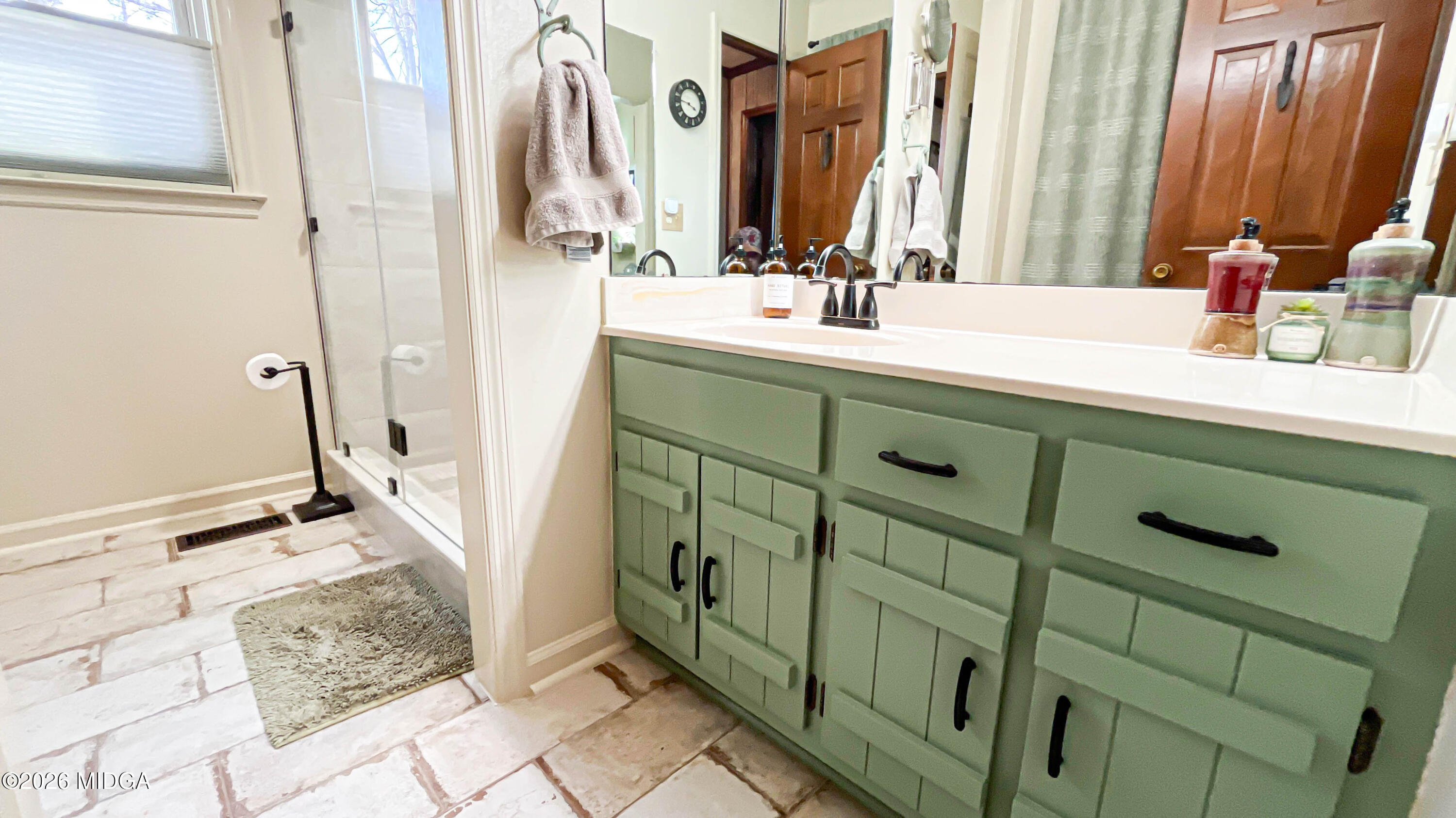 523 Fredonia Church Road Barnesville, GA 30204 - Photo 48 of 78 a bathroom with a sink and a mirror