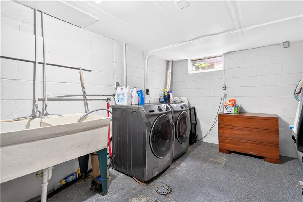 1642 Rostraver Road Belle Vernon, PA 15012 - Photo 23 of 32 a utility room with dryer and washer